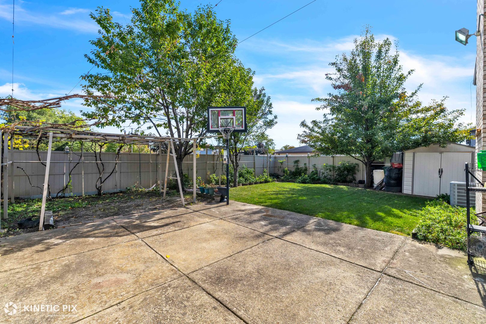 8619 Linder Avenue Burbank, IL 60459 - Photo 34 of 40 a view of a yard with a house in the background