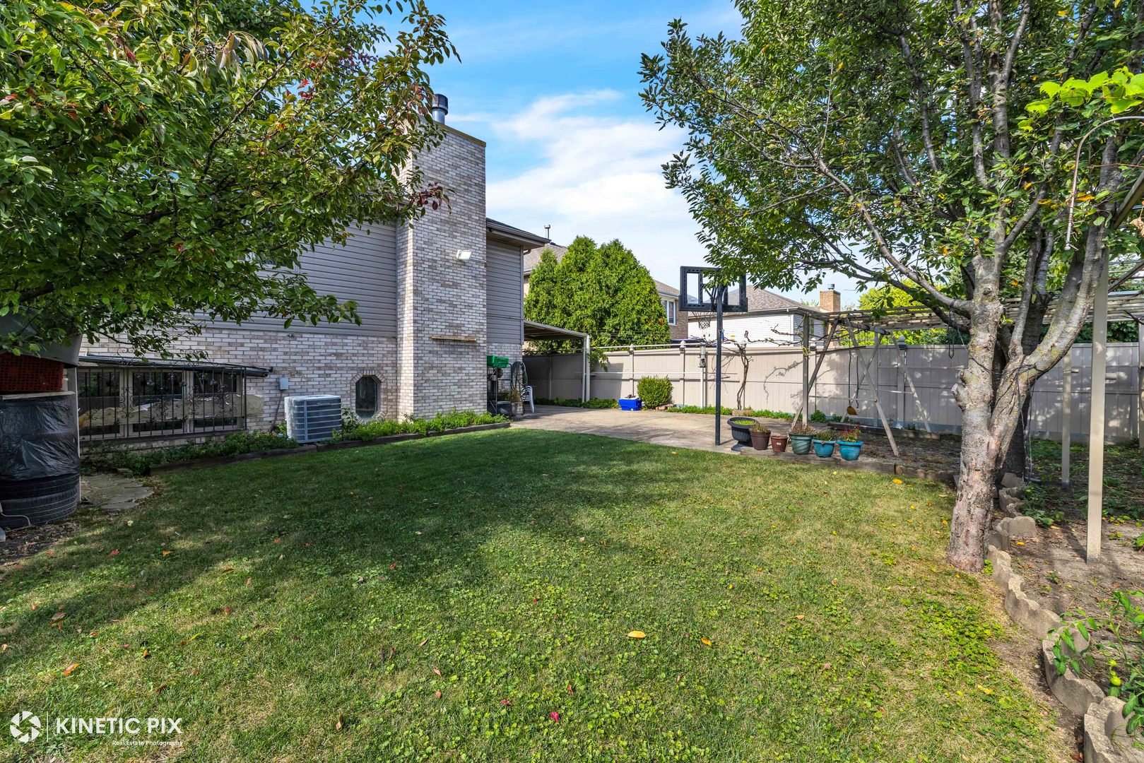 8619 Linder Avenue Burbank, IL 60459 - Photo 35 of 40 a view of a house with a back yard