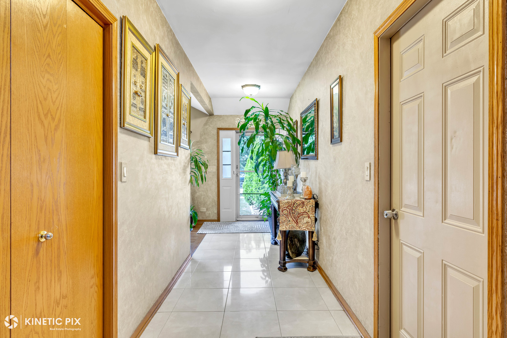 8619 Linder Avenue Burbank, IL 60459 - Photo 7 of 40 a view of an entryway with wooden floor and a livingroom