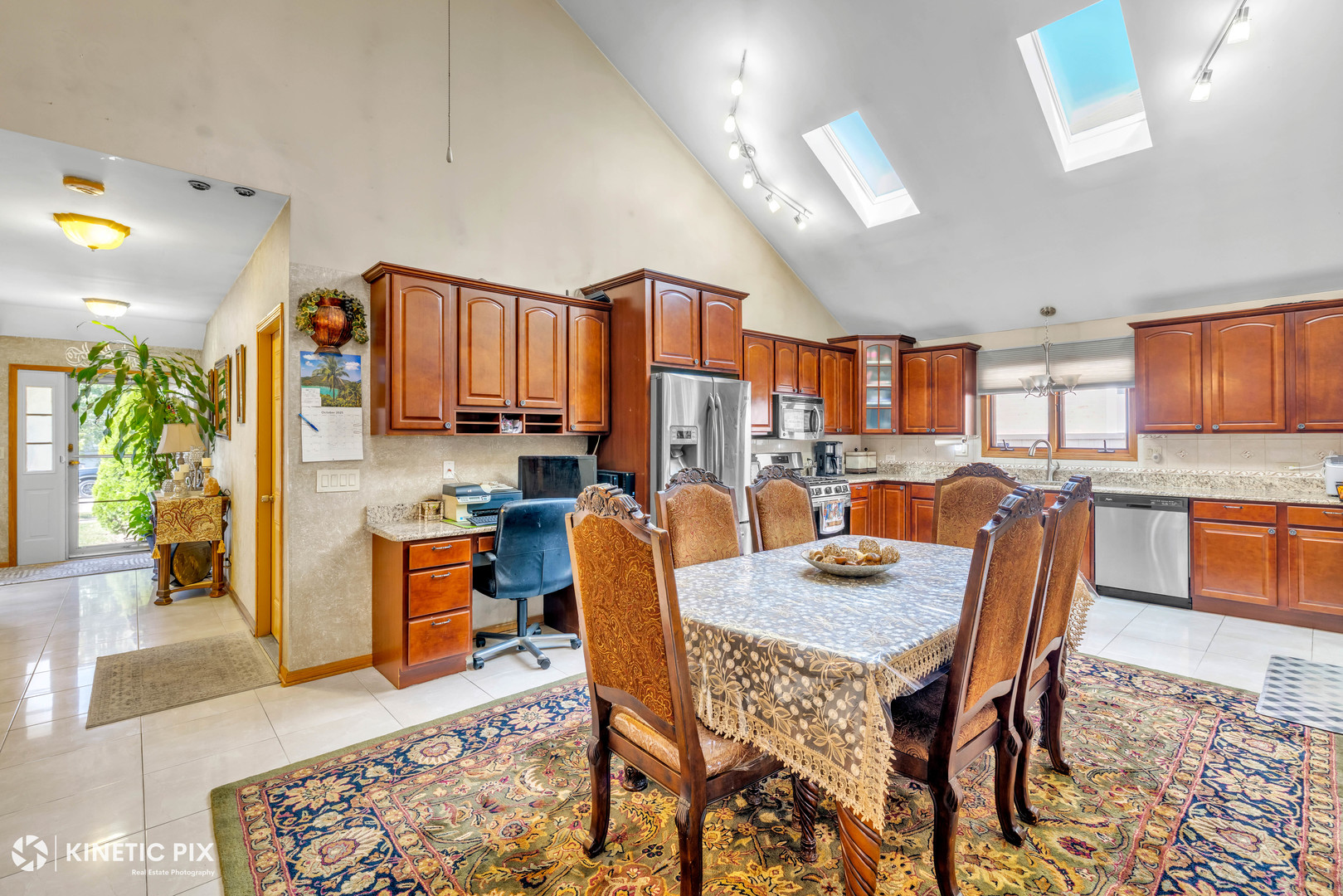 8619 Linder Avenue Burbank, IL 60459 - Photo 10 of 40 a dining room with furniture a window and kitchen view