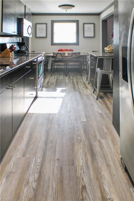 134 Fraley Fields Road High Point, NC 27262 - Photo 11 of 21 New Refrigerator, LVP flooring, paint and trim.