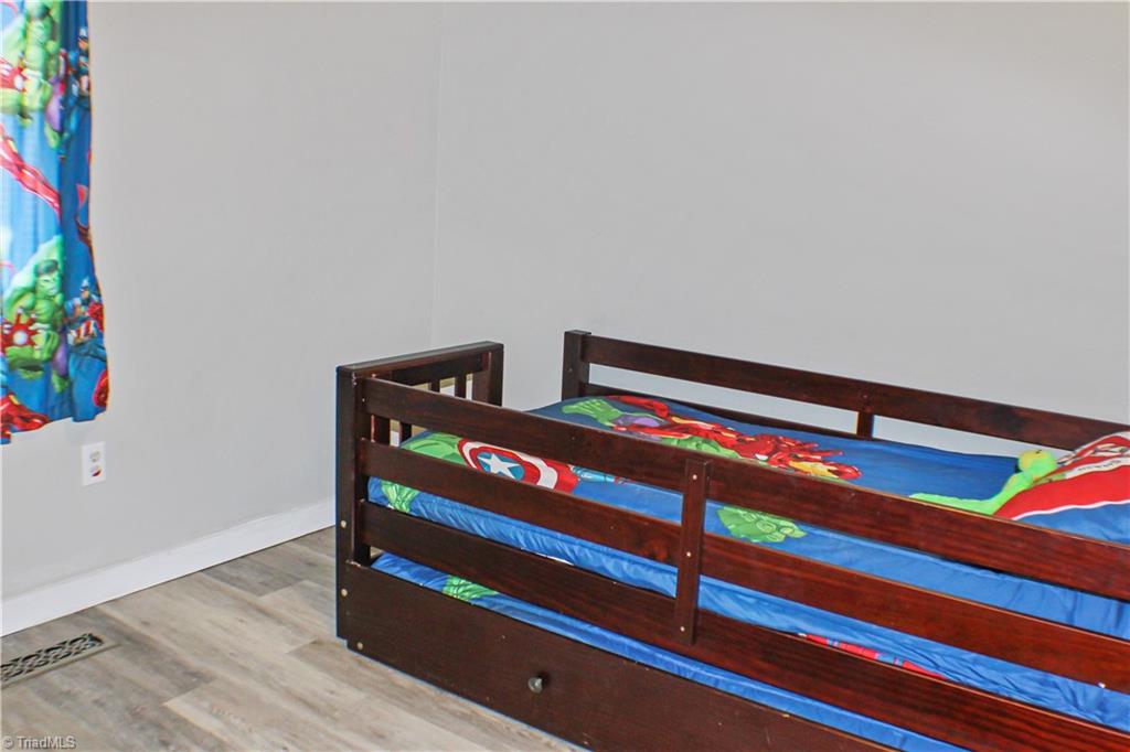 134 Fraley Fields Road High Point, NC 27262 - Photo 16 of 21 2nd bedroom with new flooring and paint.