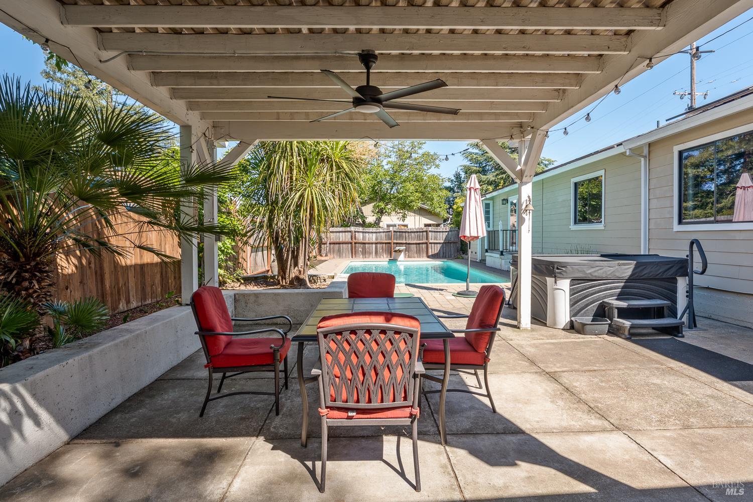 2260 Old River Road Ukiah, CA 95482 - Photo 9 of 29 a view of a patio with a table chairs and a couple of chairs