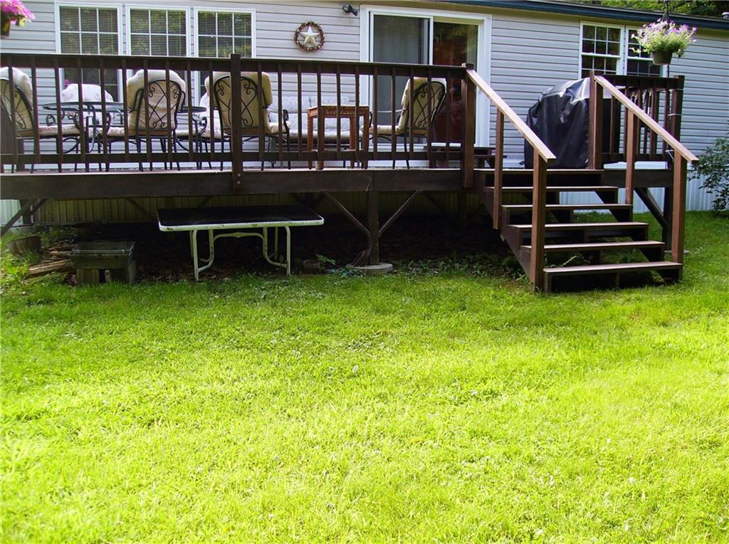 131 Mt Tom Road Smithfield, ME 04978 - Photo 22 of 30 Back of home features a nice deck...