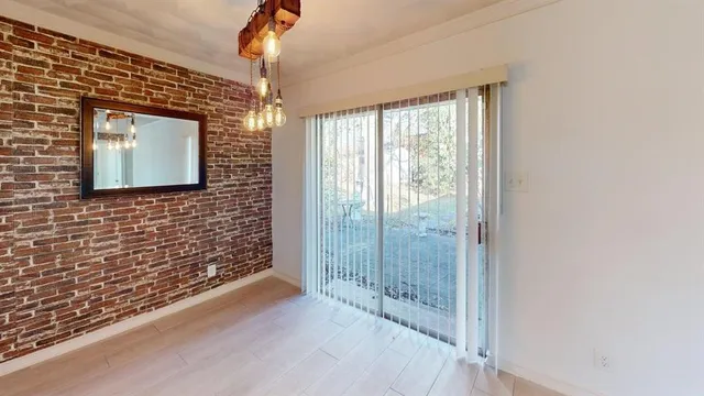 a view of a room that has window in it