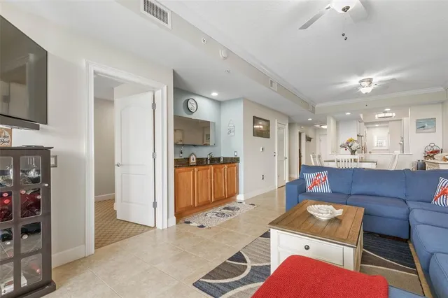 a bathroom with a granite countertop sink and a bathtub