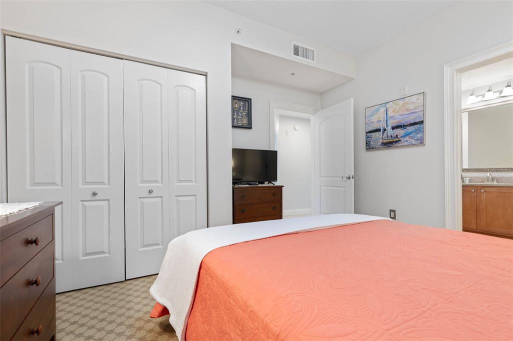 102 Yacht Harbor Drive, Unit 567 Palm Coast, FL 32137 - Photo 33 of 59 a bedroom with a bed and a window