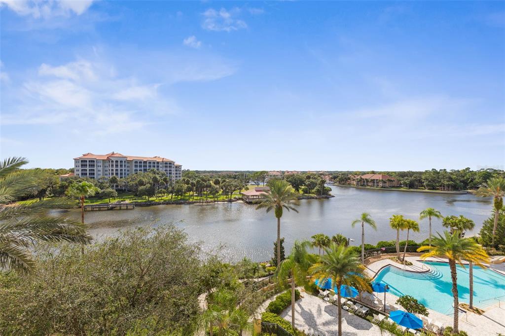 102 Yacht Harbor Drive, Unit 567 Palm Coast, FL 32137 - Photo 38 of 59 a view of a lake with tall buildings