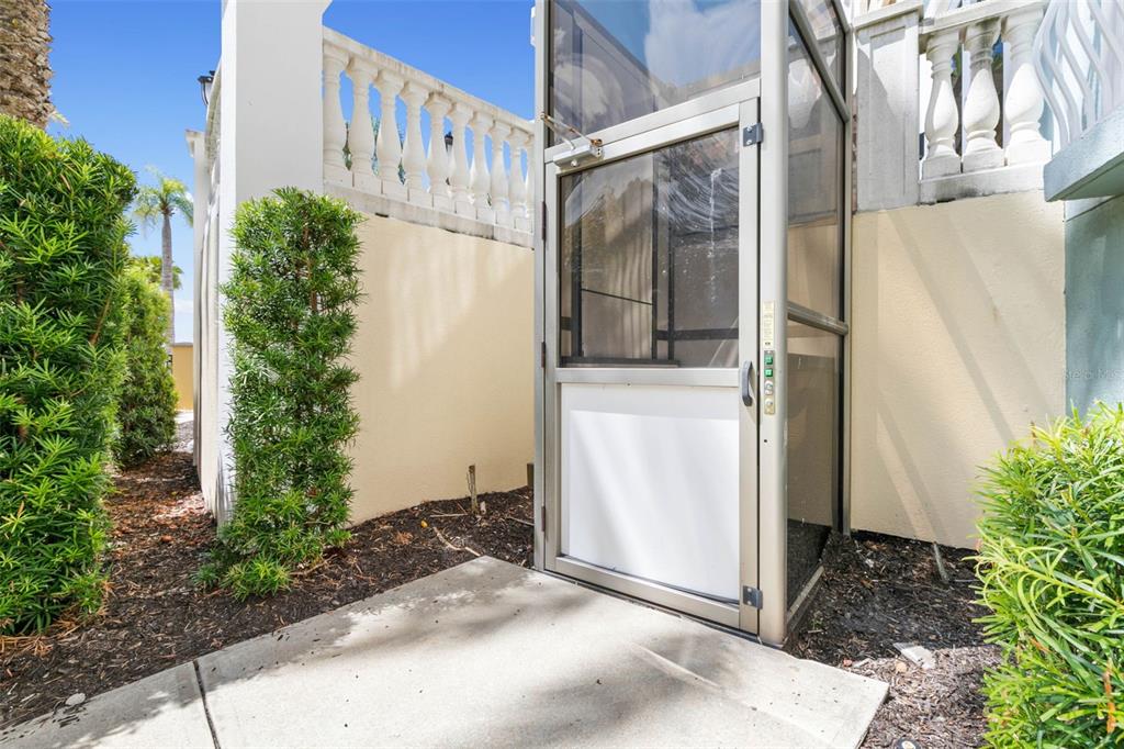 102 Yacht Harbor Drive, Unit 567 Palm Coast, FL 32137 - Photo 50 of 59 a view of a house with a yard and pathway