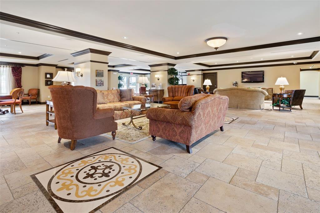 102 Yacht Harbor Drive, Unit 567 Palm Coast, FL 32137 - Photo 53 of 59 a living room with furniture and a table