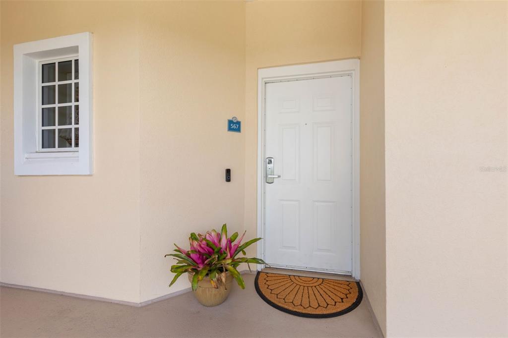 102 Yacht Harbor Drive, Unit 567 Palm Coast, FL 32137 - Photo 9 of 59 a view of a hallway with entryway