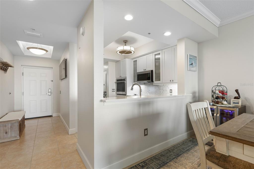 102 Yacht Harbor Drive, Unit 567 Palm Coast, FL 32137 - Photo 10 of 59 a view of a kitchen and dining room