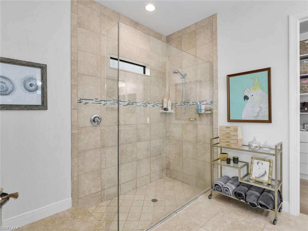 4743 Abaca Circle Naples, FL 34119 - Photo 25 of 50 Full bathroom with a walk in shower and recessed lighting