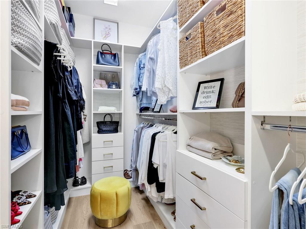 4743 Abaca Circle Naples, FL 34119 - Photo 27 of 50 Spacious closet with light wood finished floors