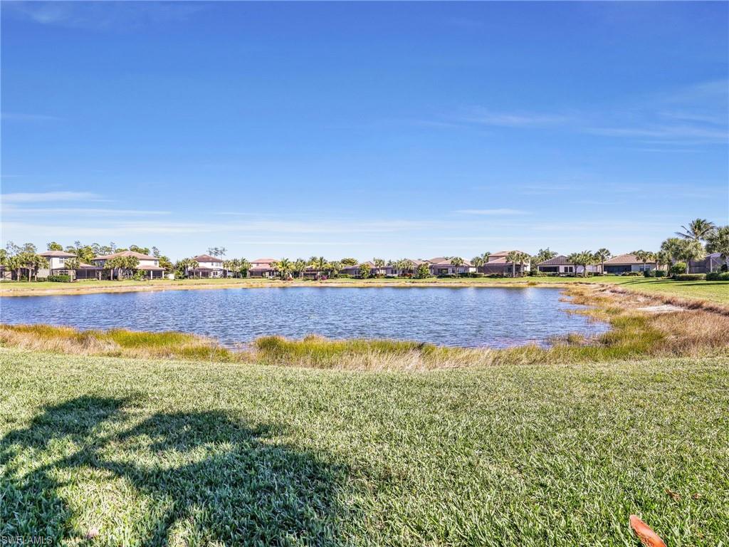 4743 Abaca Circle Naples, FL 34119 - Photo 44 of 50 Water view with nearby suburban area