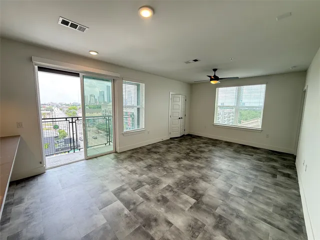 an empty room with windows