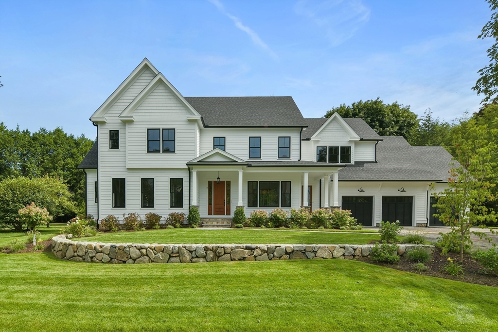 2 Saddle Club Road Lexington, MA 02420 - Photo 1 of 1 a front view of a house with a yard