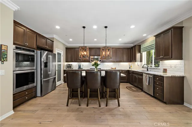 a view of a small yard with potted plants