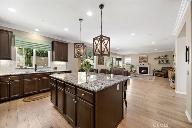 a bedroom with a bed and a potted plant