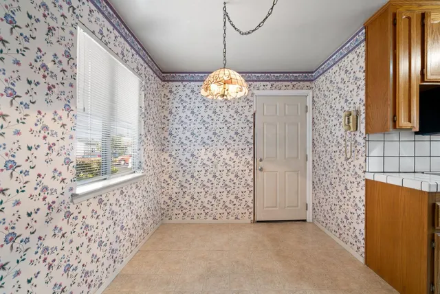 a bathroom with a sink and a shower