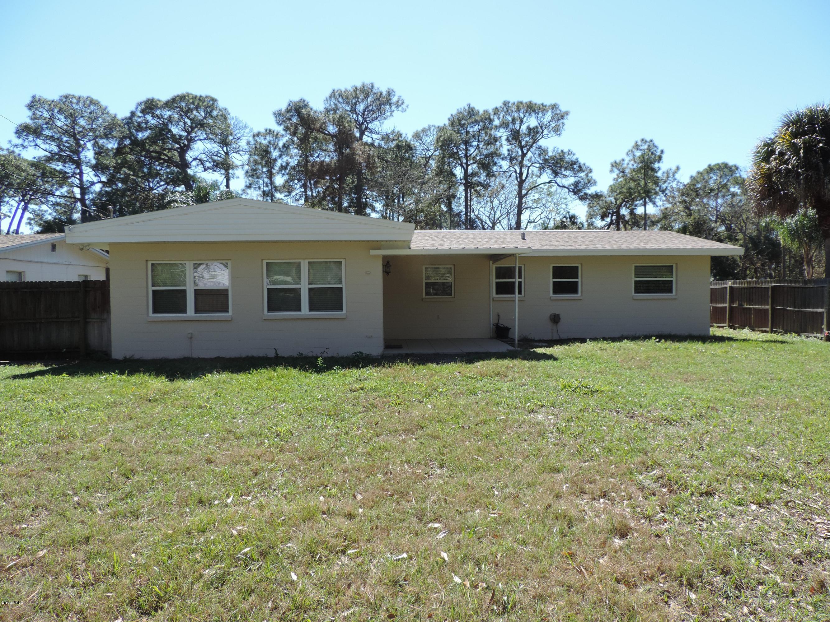 1046 Hayden Road Rockledge, FL 32955 - Photo 27 of 31 Back view of home