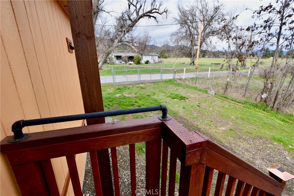 14804 Oregon Road Hornbrook, CA 96044 - Photo 21 of 26 a view of outdoor space with deck and trees