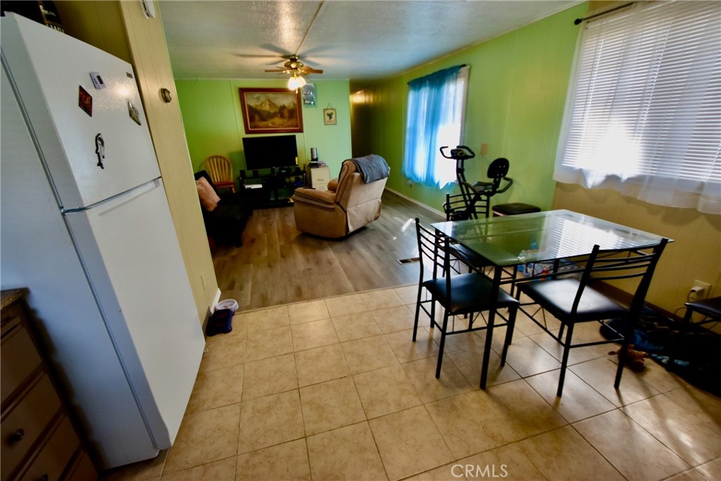14804 Oregon Road Hornbrook, CA 96044 - Photo 7 of 26 a living room with furniture and a flat screen tv