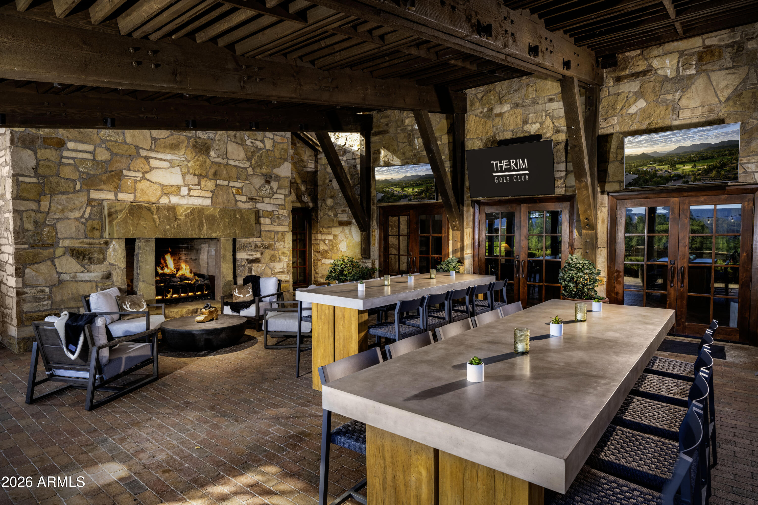 3103 East Game Trail, Unit 253 Payson, AZ 85541 - Photo 11 of 12 a view of a patio with dining table and chairs