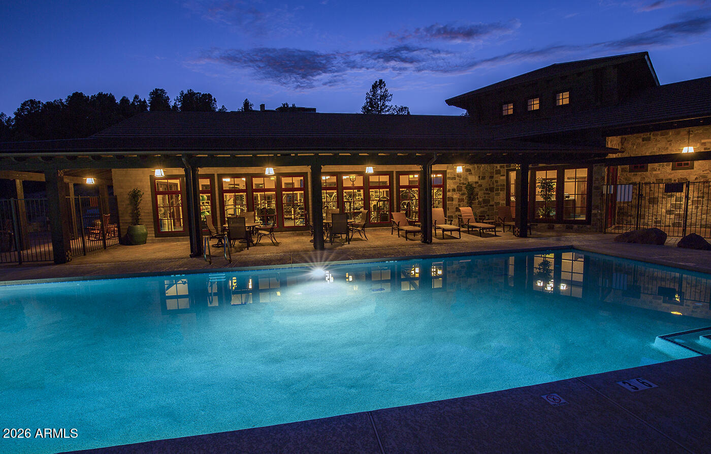 3103 East Game Trail, Unit 253 Payson, AZ 85541 - Photo 3 of 12 a view of a swimming pool with an outdoor seating