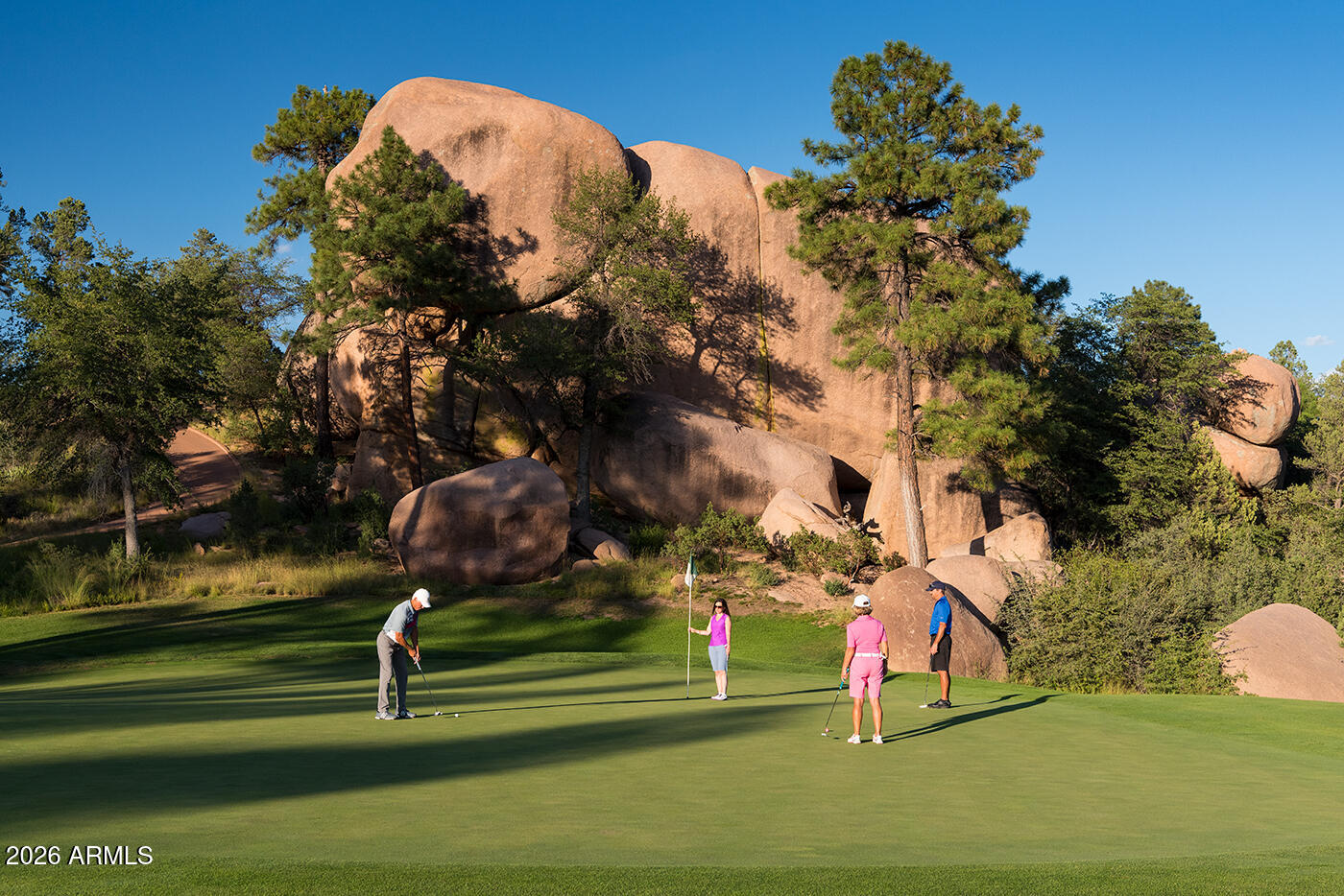 3103 East Game Trail, Unit 253 Payson, AZ 85541 - Photo 6 of 12 a view of outdoor space and tennis court
