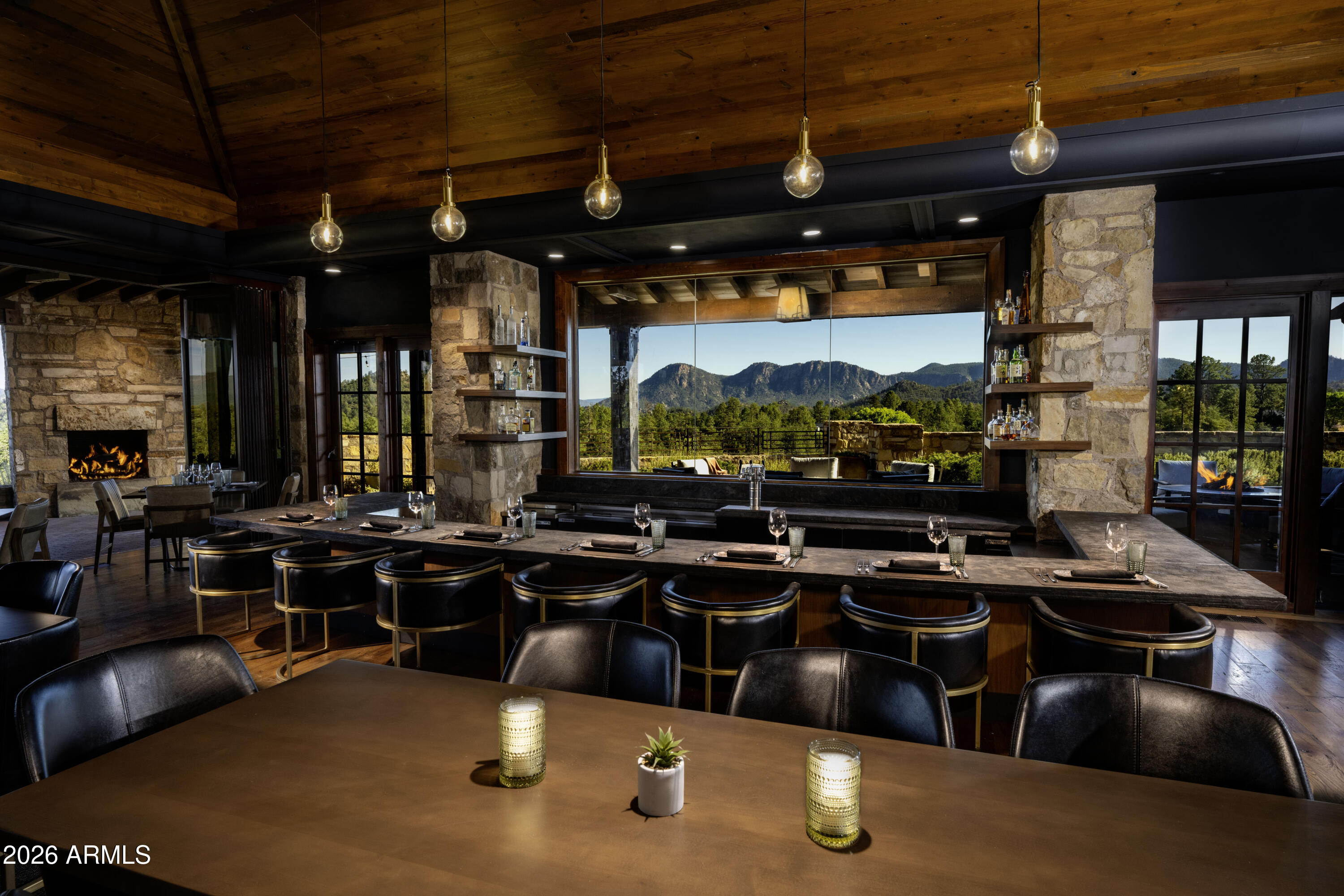 3103 East Game Trail, Unit 253 Payson, AZ 85541 - Photo 10 of 12 a kitchen with stainless steel appliances granite countertop a stove and a view of the kitchen