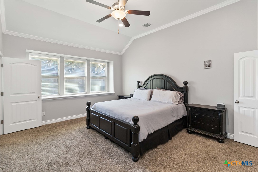8402 Ridge Crest Drive Killeen, TX 76542 - Photo 20 of 34 a bedroom with a bed and window