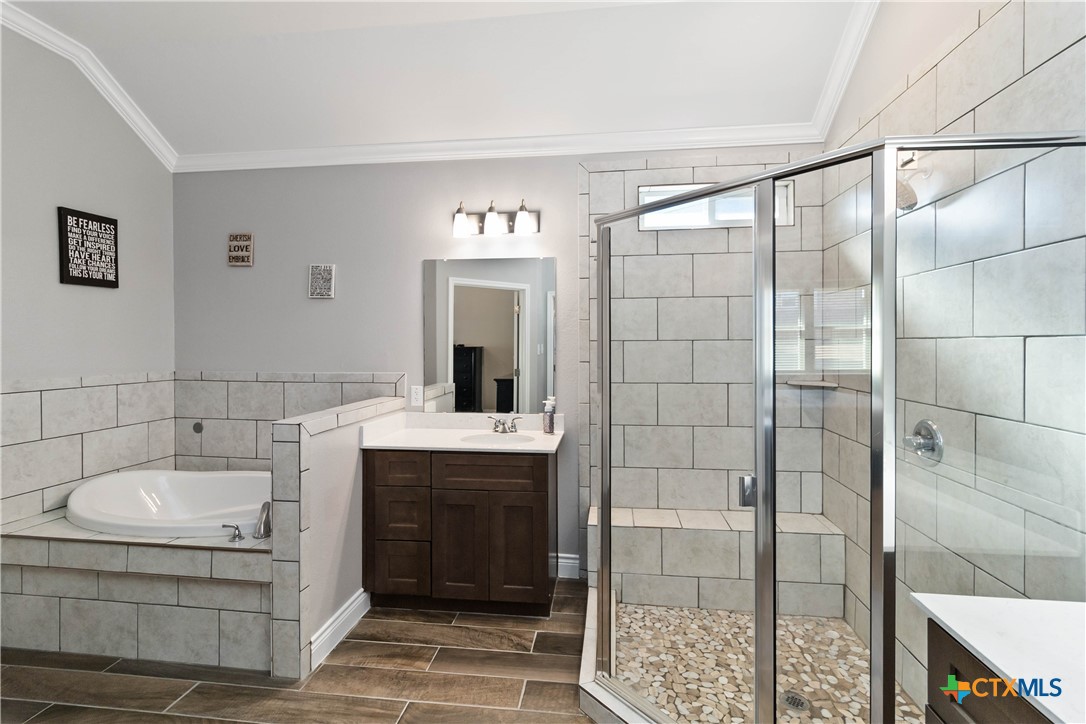8402 Ridge Crest Drive Killeen, TX 76542 - Photo 24 of 34 a spacious bathroom with a shower and a sink