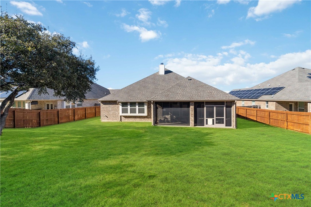 8402 Ridge Crest Drive Killeen, TX 76542 - Photo 33 of 34 a front view of a house with a garden