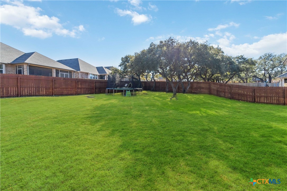8402 Ridge Crest Drive Killeen, TX 76542 - Photo 34 of 34 a view of a big yard with a house in the background