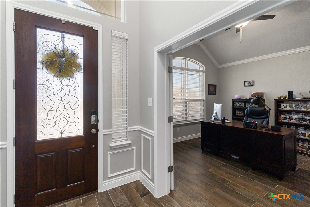 8402 Ridge Crest Drive Killeen, TX 76542 - Photo 4 of 34 a view of a kitchen from the hallway