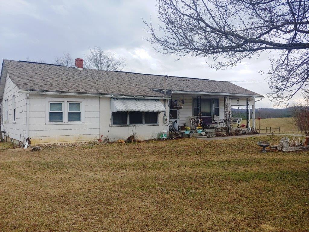 722 Poff School Road Riner, VA 24149 - Photo 40 of 49 a front view of a house with a yard