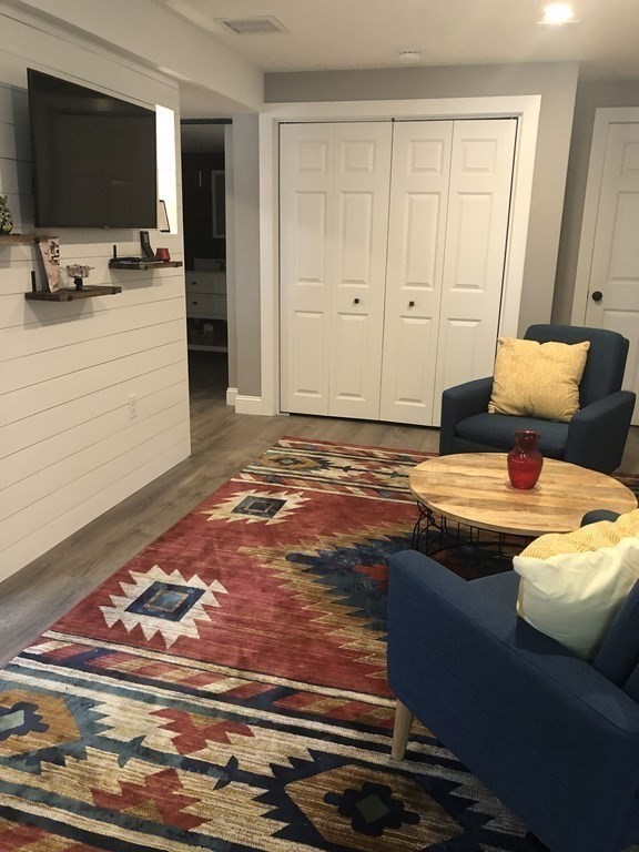 1 Park Road, Unit 1 Sandwich, MA 02644 - Photo 12 of 25 a bedroom with a bed and a flat screen tv