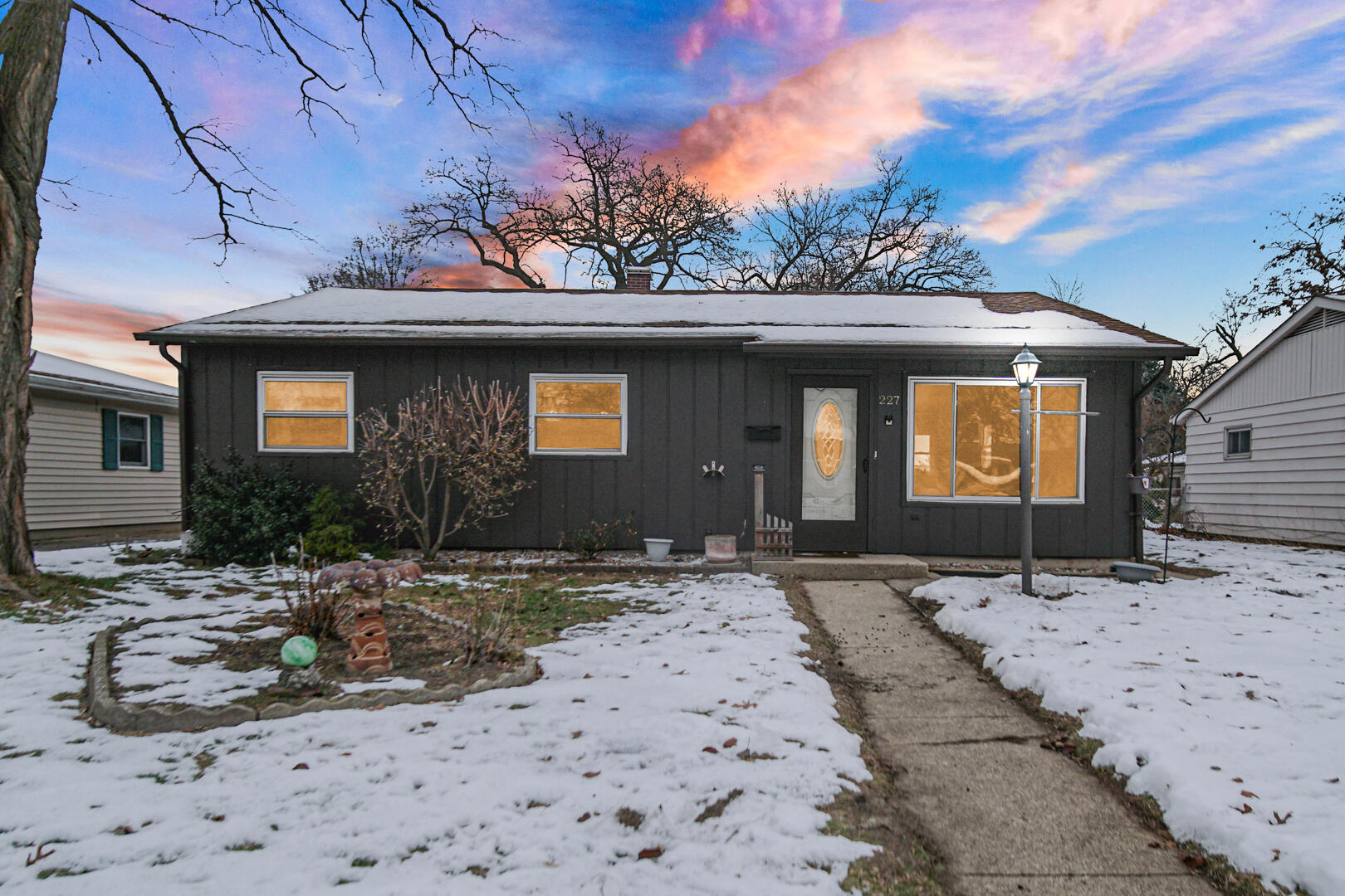 a front view of a house with a pathway