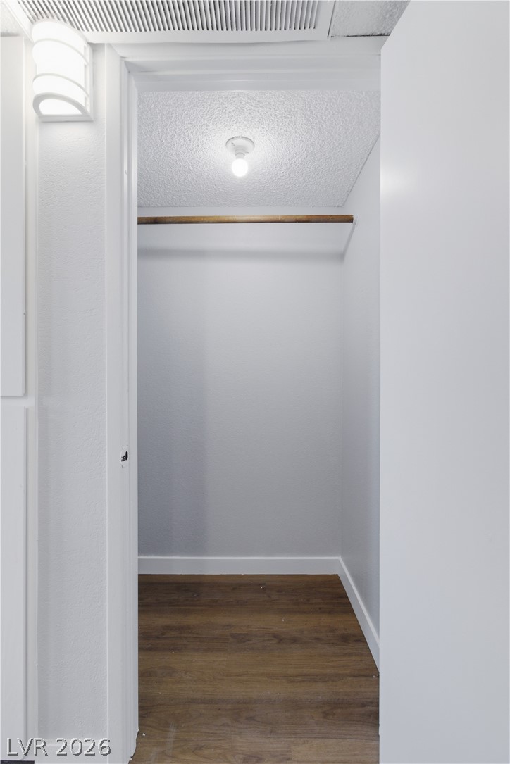 2221 West Bonanza Road, Unit 28 Las Vegas, NV 89106 - Photo 6 of 15 This spacious closet offers practical storage solutions with durable flooring and bright lighting.