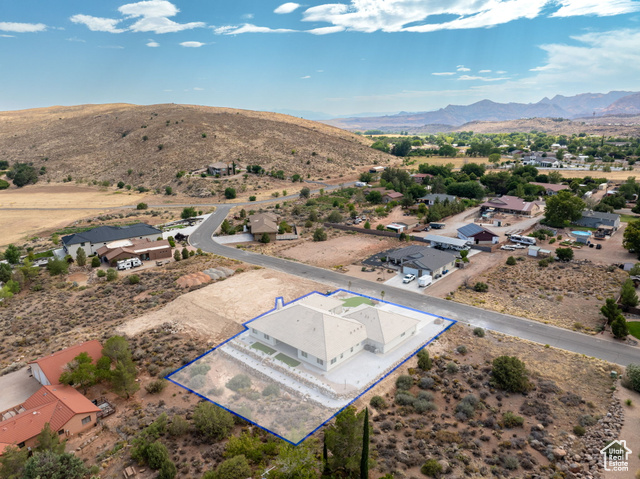 230 Boulder Way Leeds, UT 84746 - Photo 64 of 72 Aerial view of residential area with property parcel outlined and a mountain backdrop