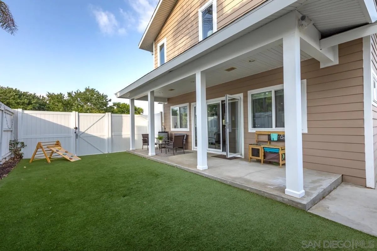 1448 Third Street Coronado, CA 92118 - Photo 12 of 30 a view of a house with backyard porch and sitting area