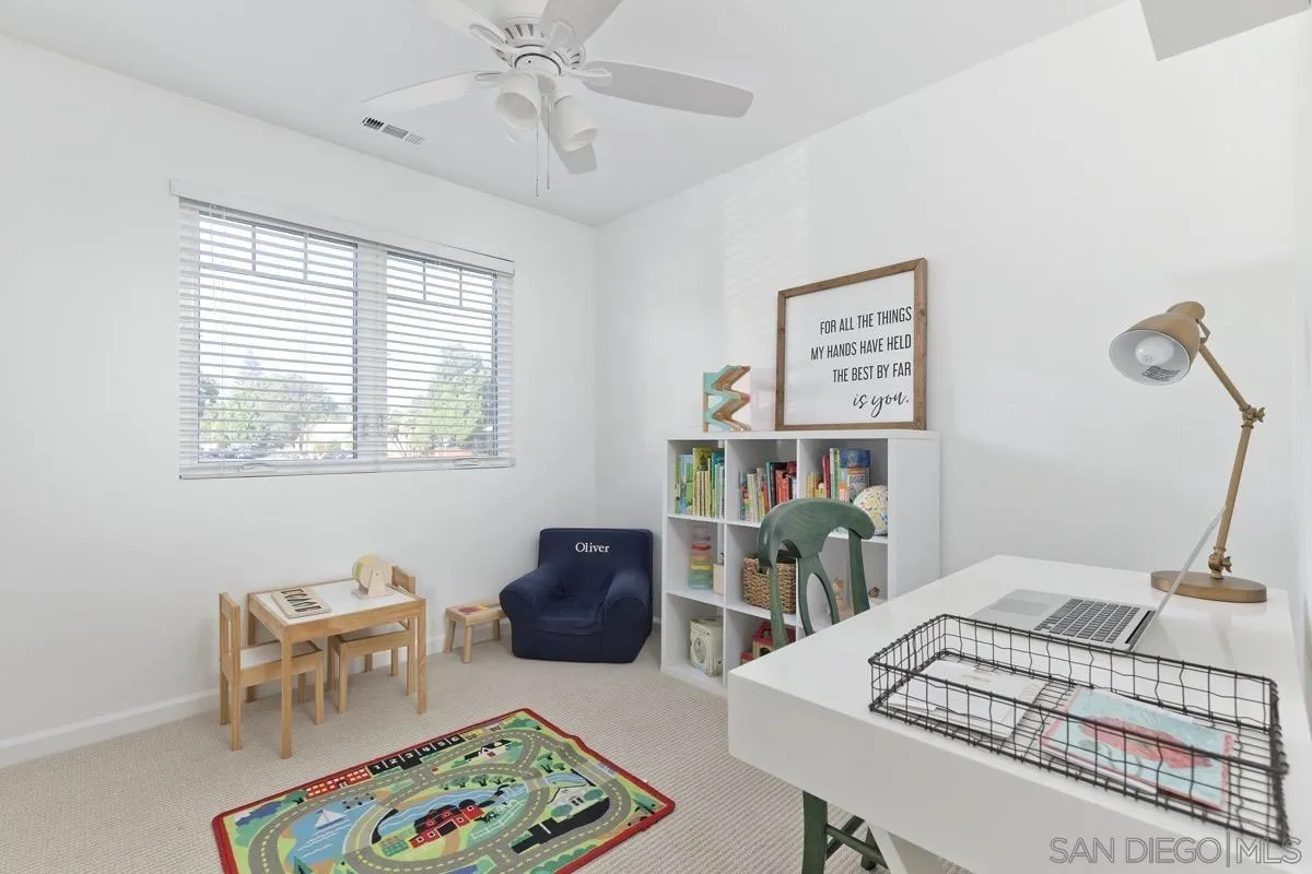 1448 Third Street Coronado, CA 92118 - Photo 18 of 30 a bedroom with furniture and a window