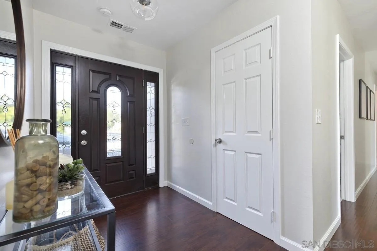 1448 Third Street Coronado, CA 92118 - Photo 2 of 30 wooden floor with windows and wooden floor
