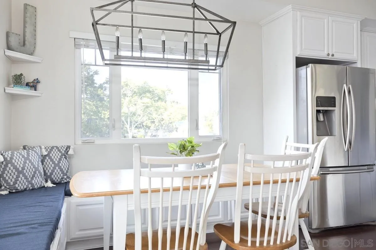 1448 Third Street Coronado, CA 92118 - Photo 7 of 30 a bedroom with furniture and a window