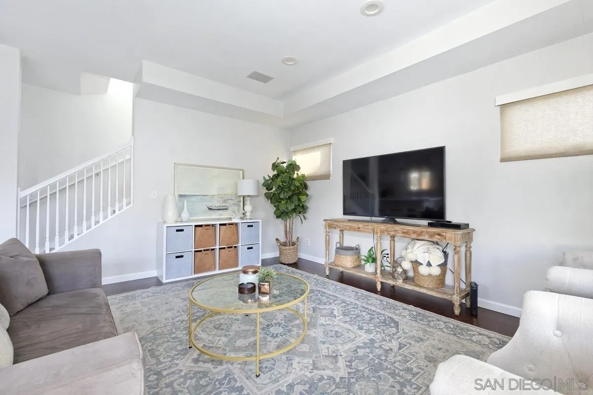 1448 Third Street Coronado, CA 92118 - Photo 9 of 30 a living room with furniture and a flat screen tv