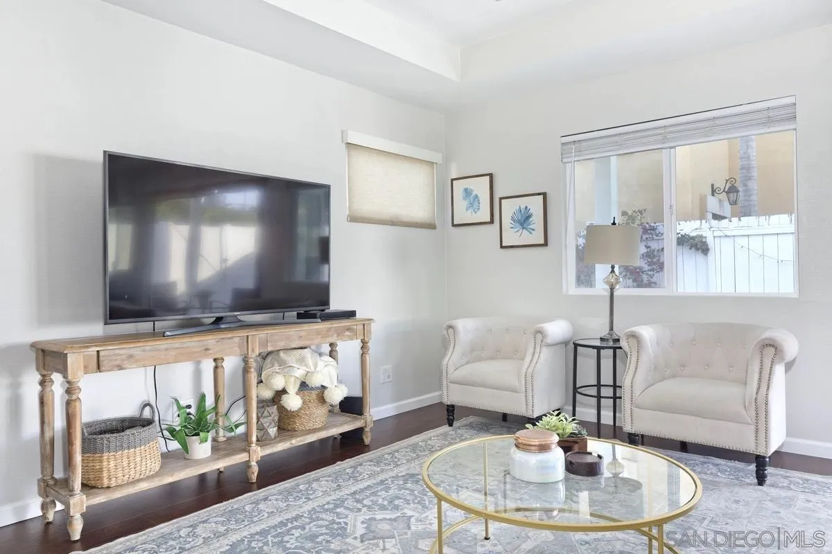 1448 Third Street Coronado, CA 92118 - Photo 10 of 30 a living room with furniture and a flat screen tv