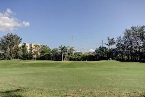 a view of a park with of swings and slides
