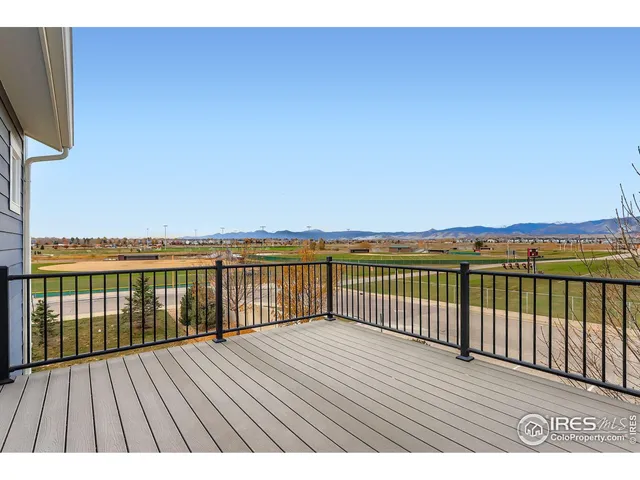 a view of wooden balcony with wooden floor