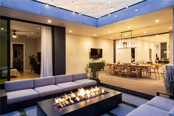 a living room with furniture and a table